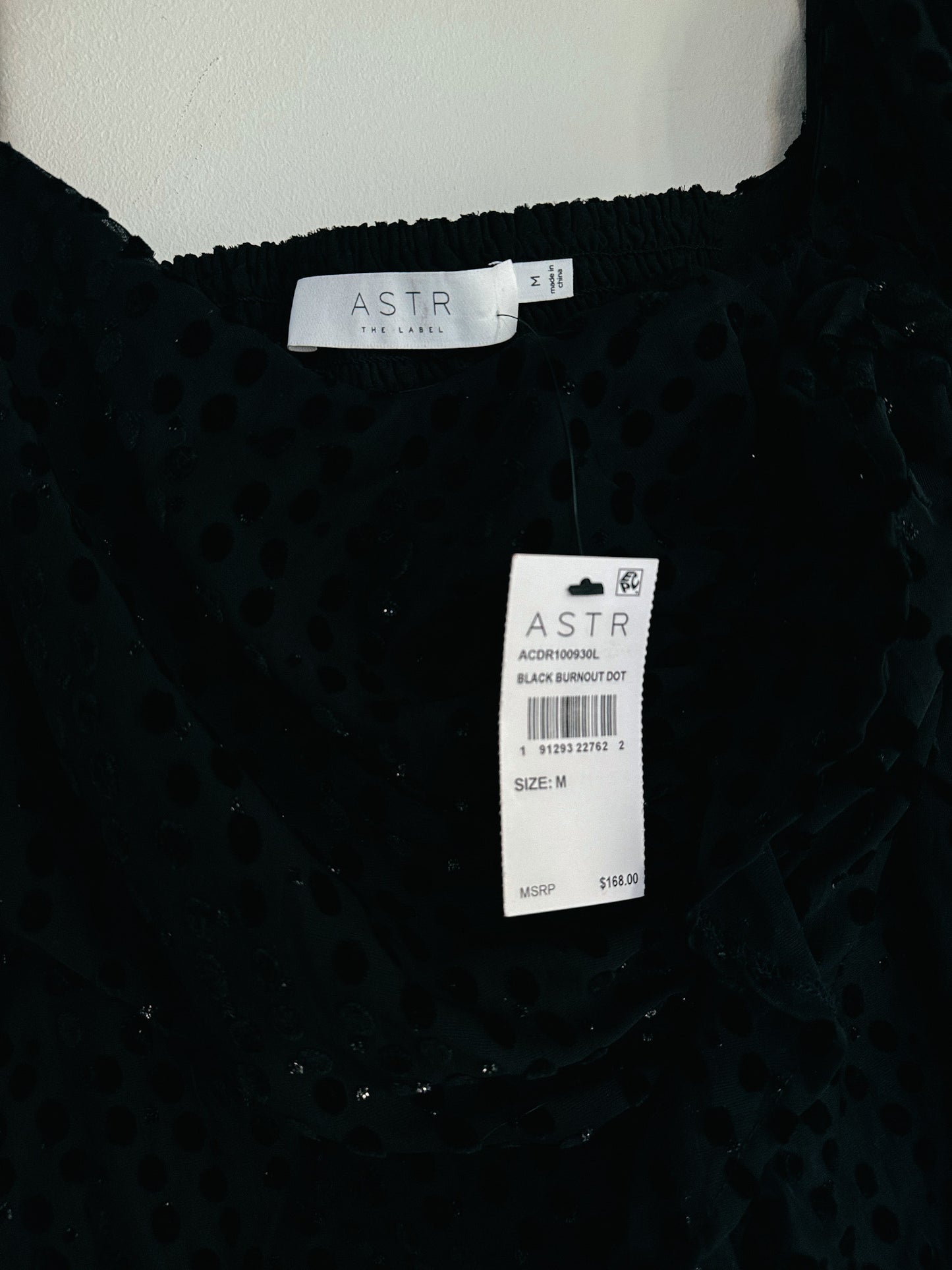 ASTR The Label Athens Black Burnout Dot Dress tag closeup