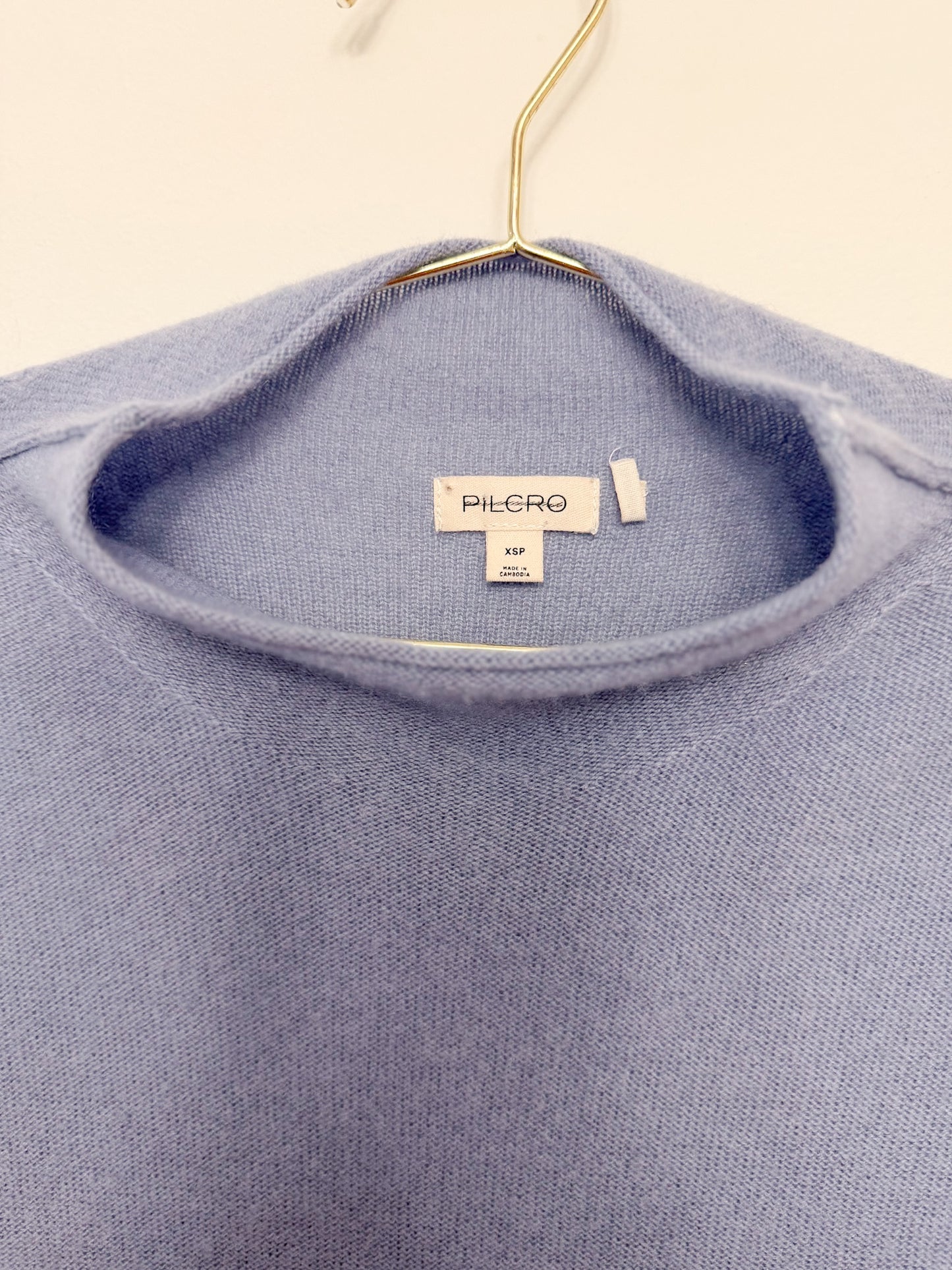 The Alani Cashmere Mock-Neck Sweater by Pilcro