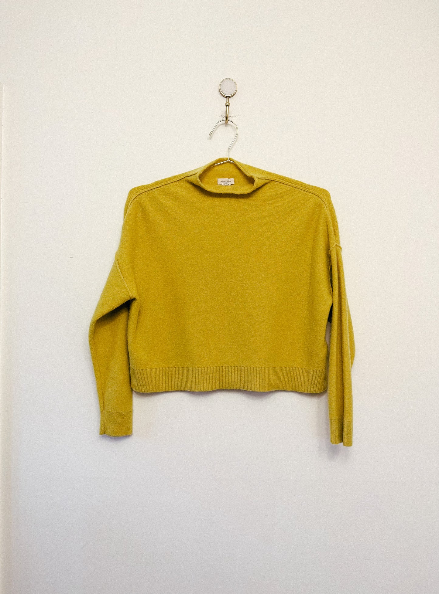 The Alani Cashmere Mock-Neck Sweater by Pilcro