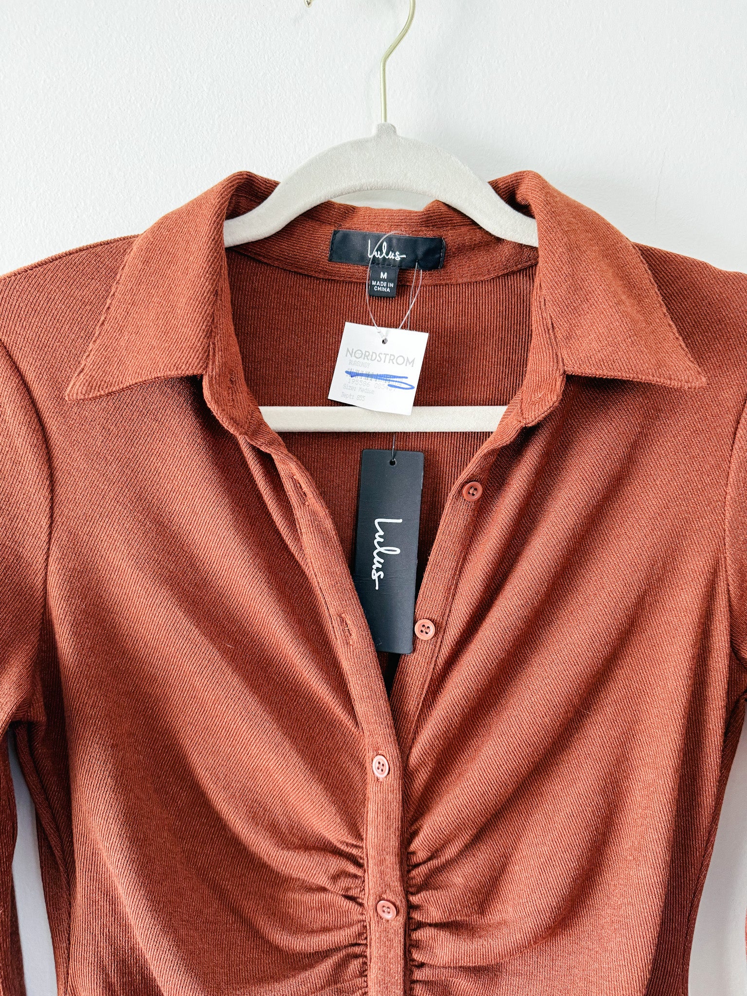 Lulus A Little Prep Rust Brown Button-Up Bodycon Mini Dress close up of collar and tag