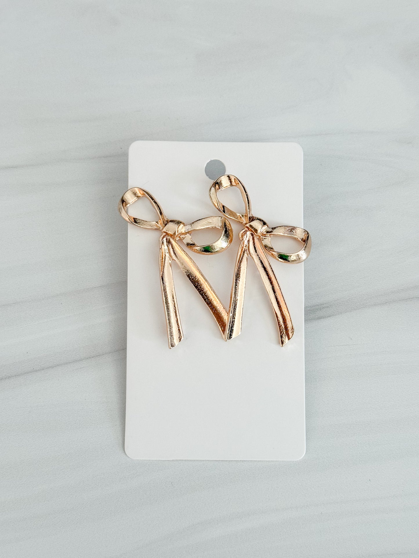 Bow Stud Earrings in Gold and Silver