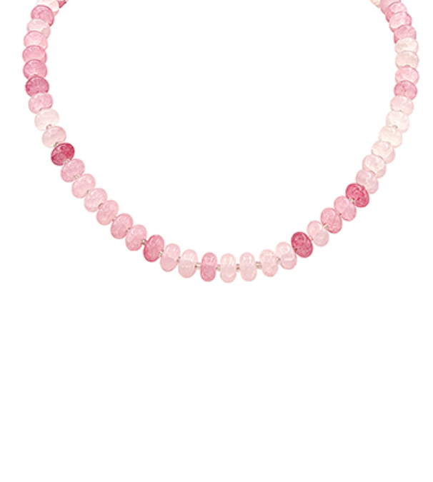 Necklace with pink beads on a white background