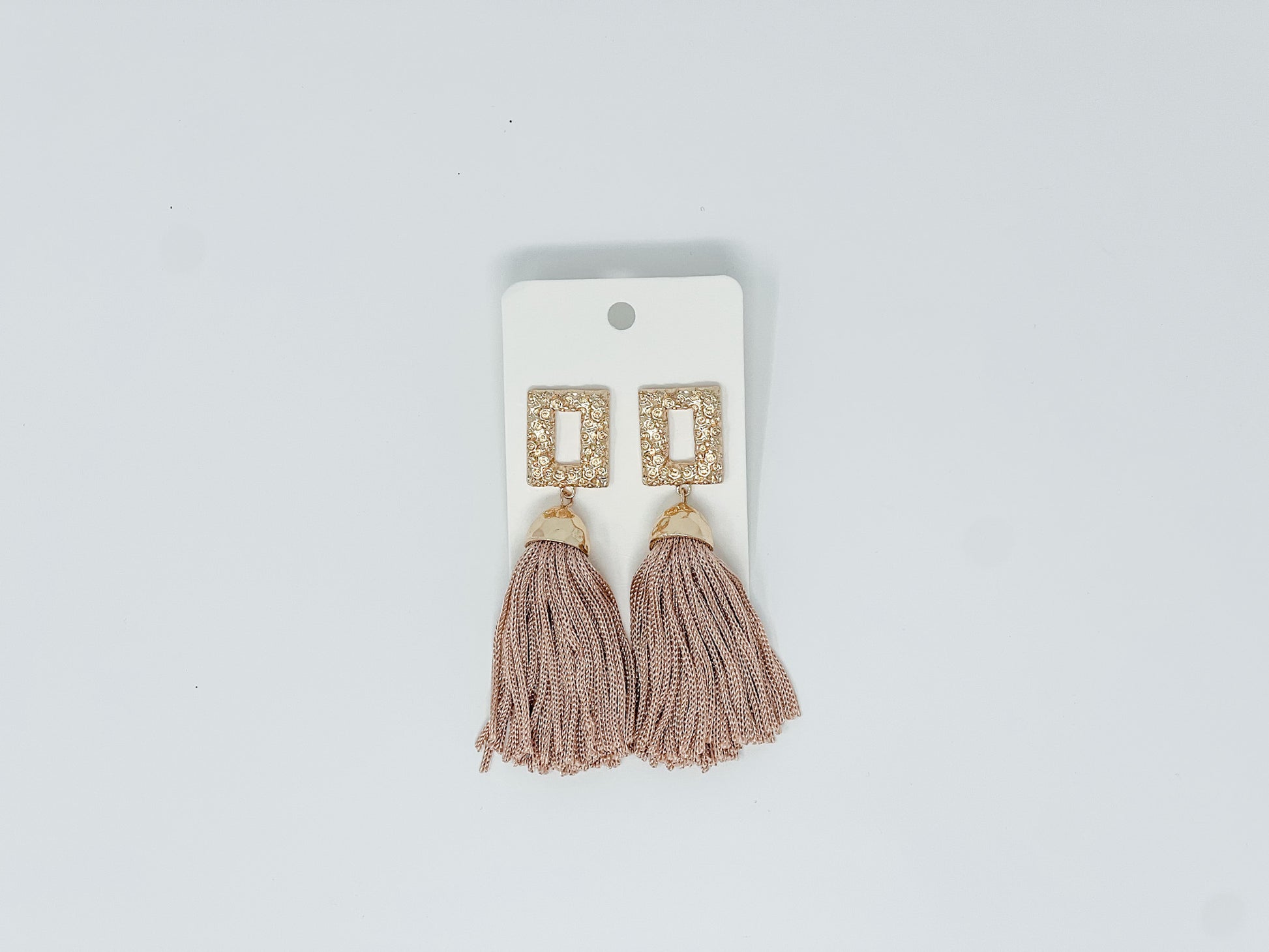 gold rectangle tassel earrings in taupe